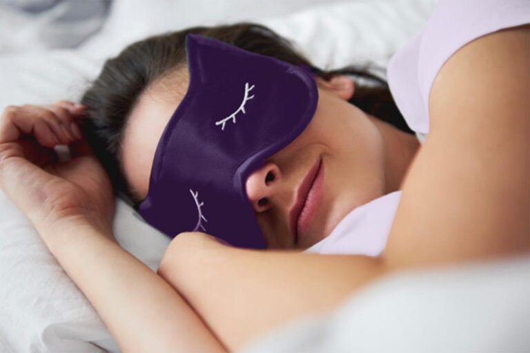 woman sleeping purple mask